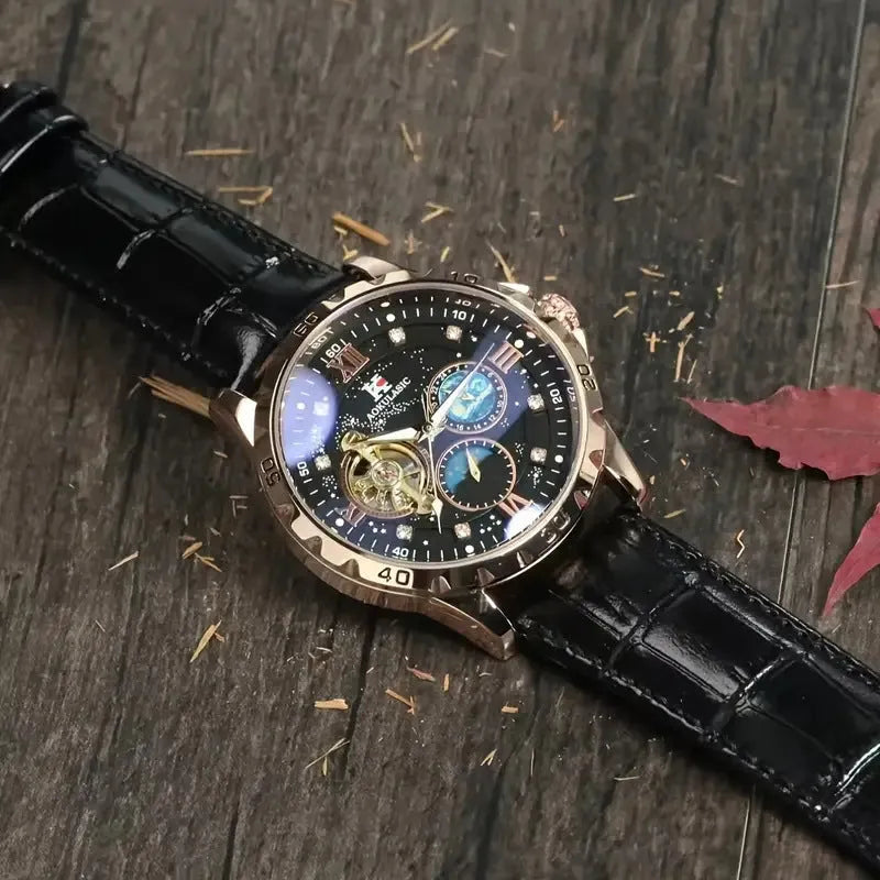 Black and rose gold automatic mechanical watch with hollow dial showing movement