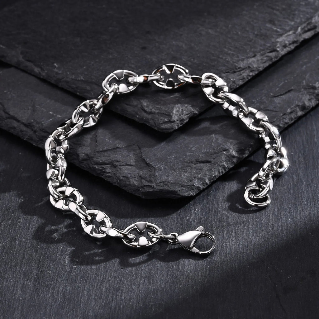 Handmade thick geometric chain link bracelet in stainless steel, shown in steel colour.