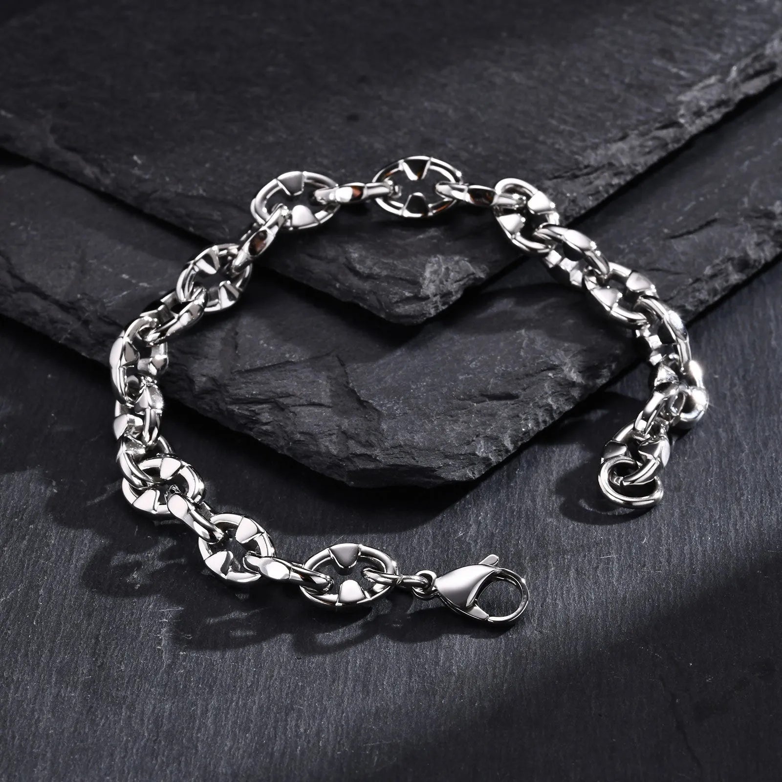 Handmade thick geometric chain link bracelet in stainless steel, shown in steel colour.