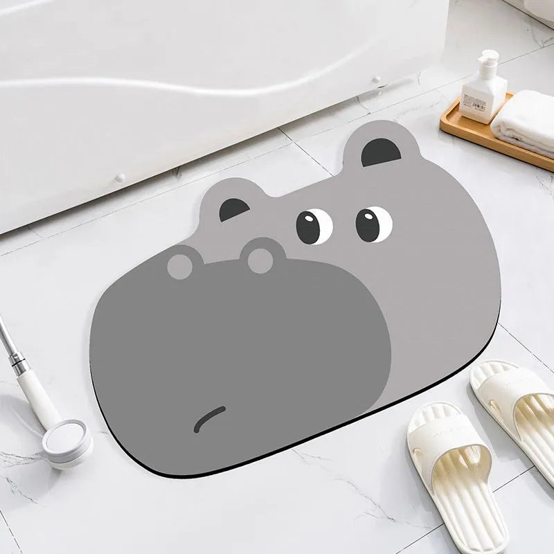 Cute animal cartoon design diatom oil absorbent non-slip bathroom mat on tiled floor.