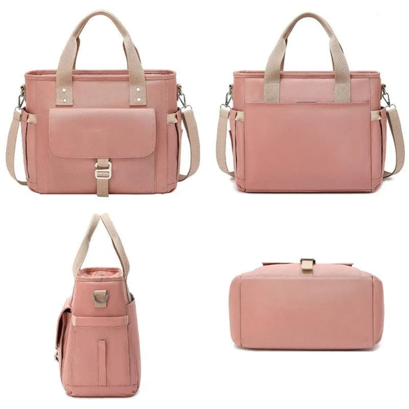 Portable cube-shaped picnic bag with removable shoulder strap and side pocket in Oxford cloth.
