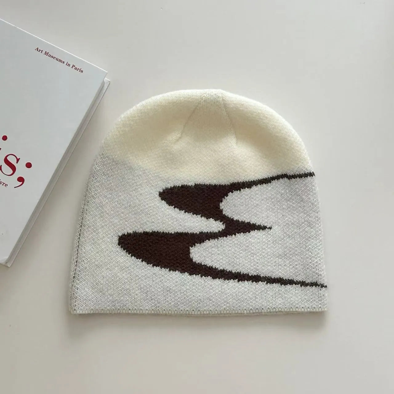 Acrylic thermal beanie hat in black colour for autumn and winter wear