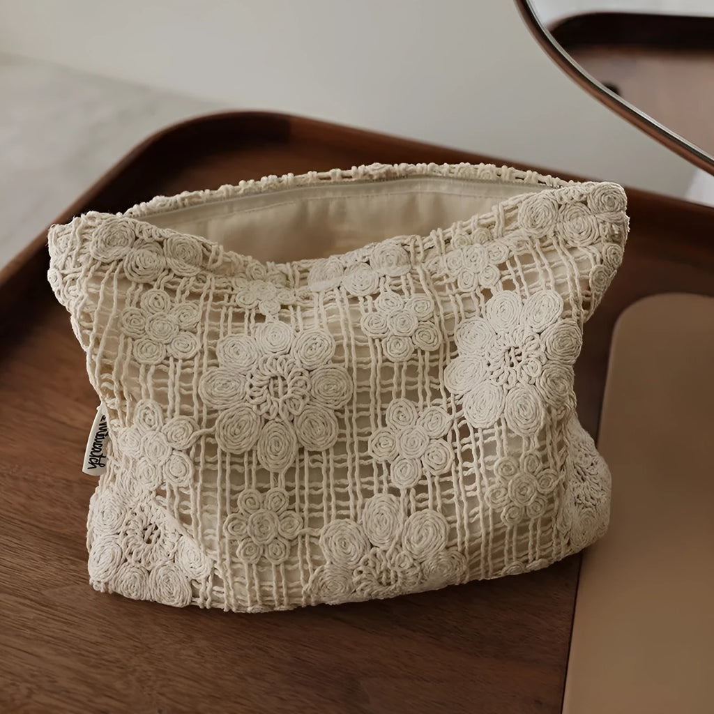 Handmade crocheted hollow flower cosmetic bag in corduroy fabric with ethnic embroidery decoration