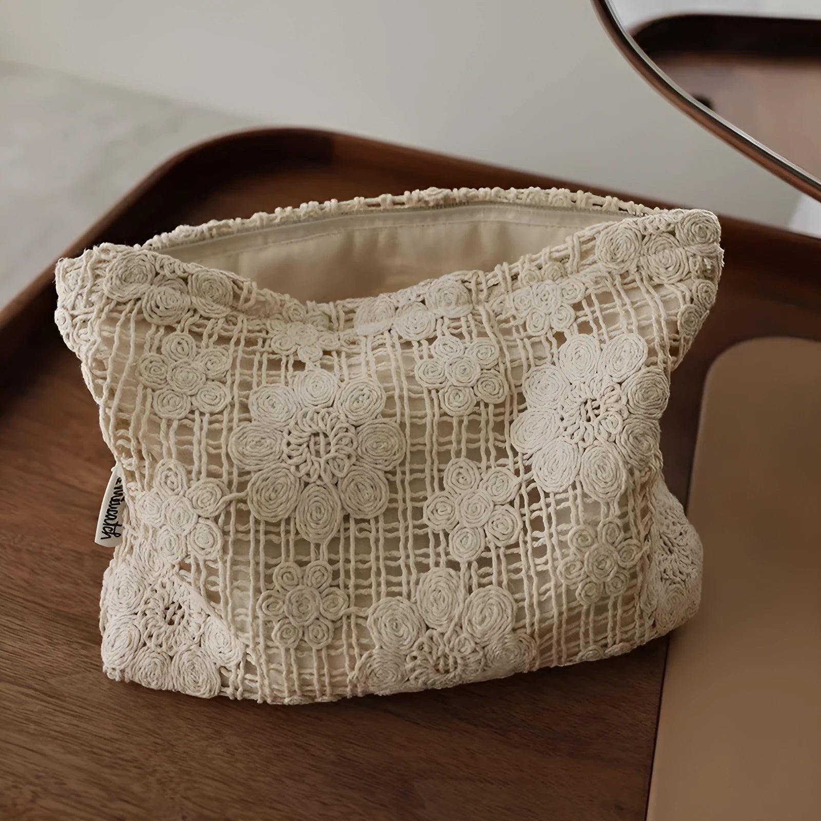 Handmade crocheted hollow flower cosmetic bag in corduroy fabric with ethnic embroidery decoration