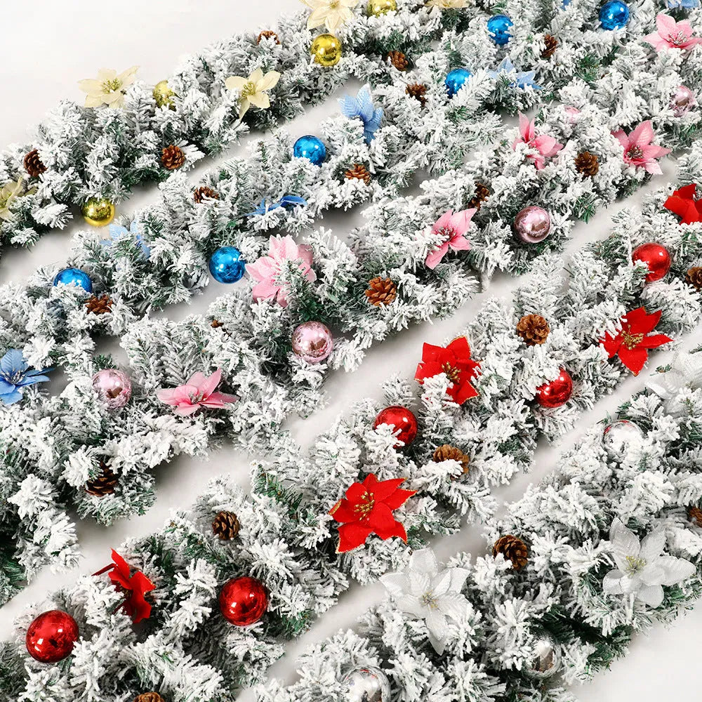 PVC Christmas rattan garland with flocked finish in golden colour option draped over mantelpiece