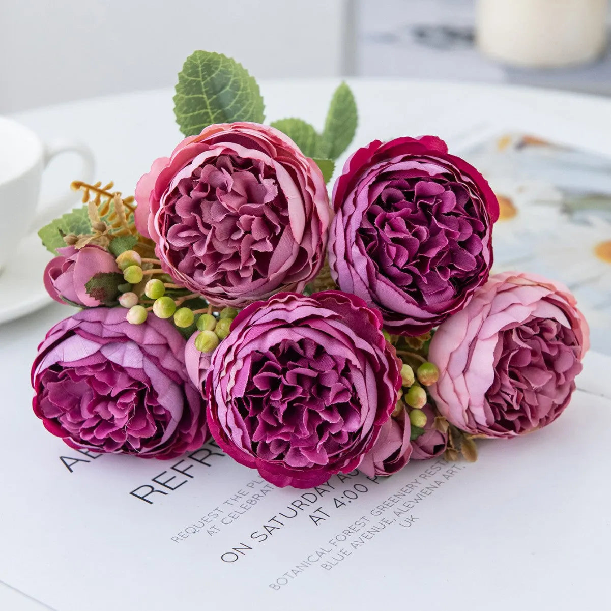 Artificial silk peony bouquet in champagne colour for home and wedding decoration.