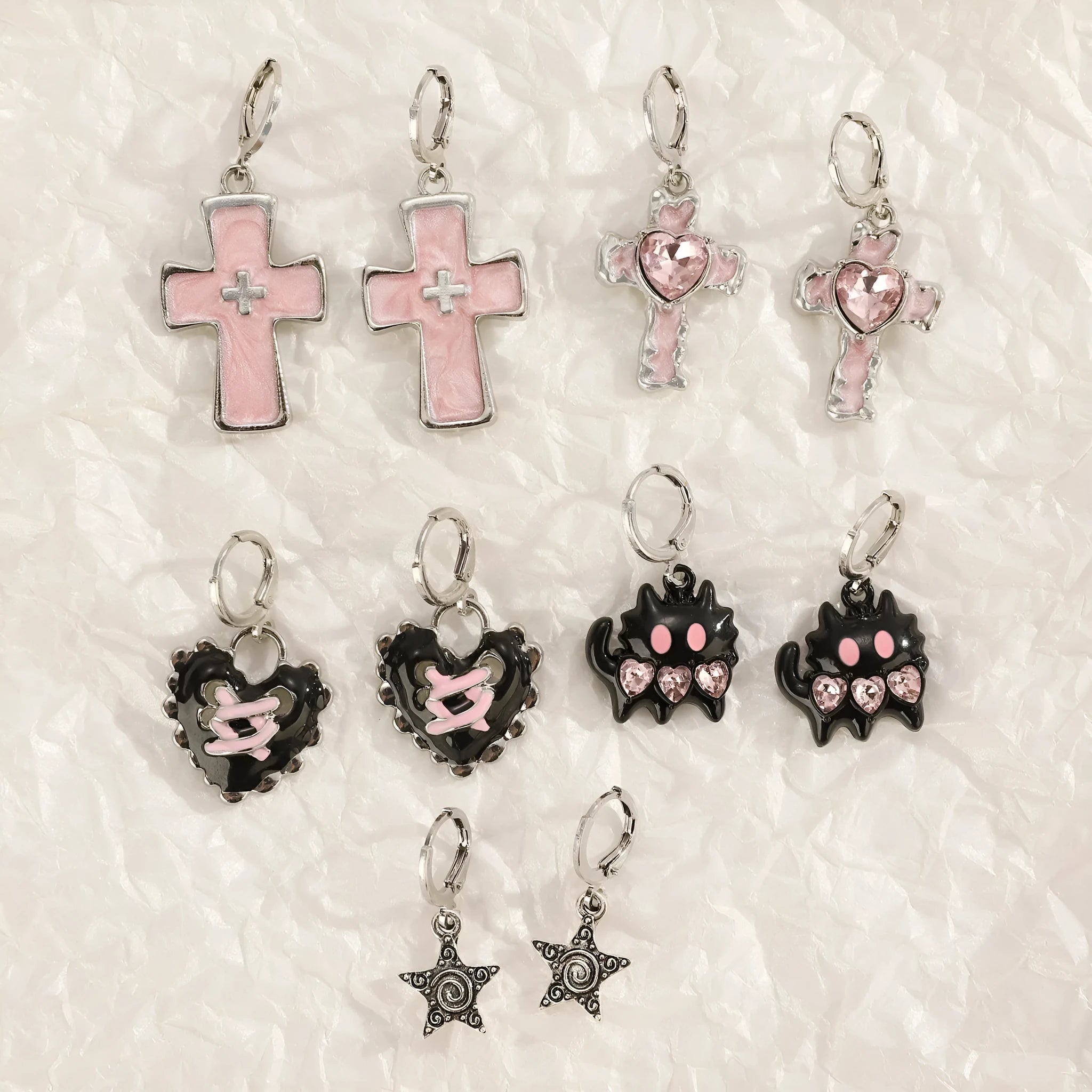Women's cross crystal earrings in five colour variations with alloy construction and geometric design