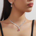 Claw chain necklace and earrings set with water drop rhinestone pendants in multiple colour options