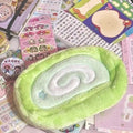 Honeydew Roll plush velvet pencil case with Swiss roll cake design for stationery storage.