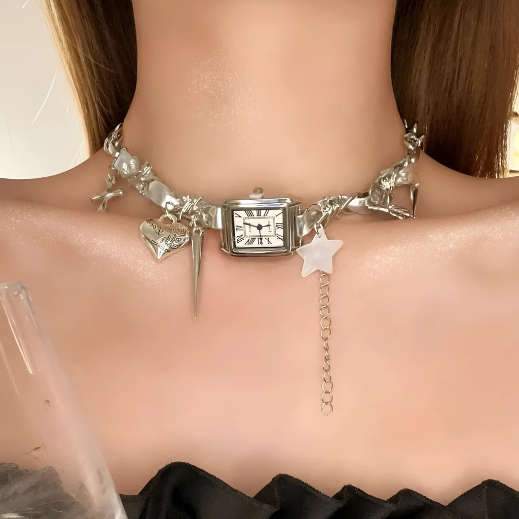 Dark multi-layer cross necklace with twin clavicle chains on model