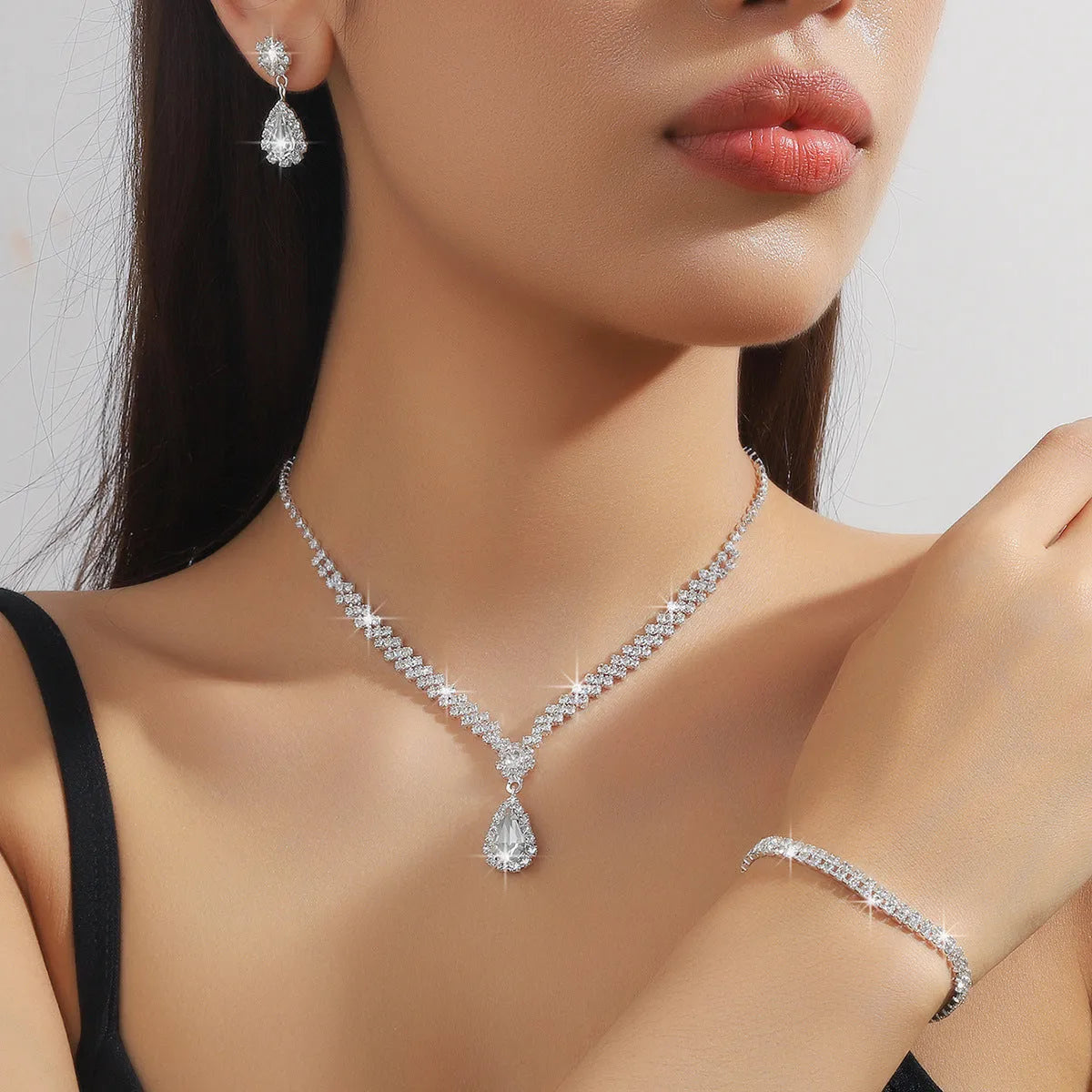 Claw chain necklace and earrings set with water drop rhinestone pendants in multiple colour options