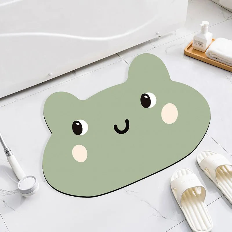 Cute animal cartoon design diatom oil absorbent non-slip bathroom mat on tiled floor.
