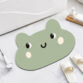 Cute animal cartoon design diatom oil absorbent non-slip bathroom mat on tiled floor.