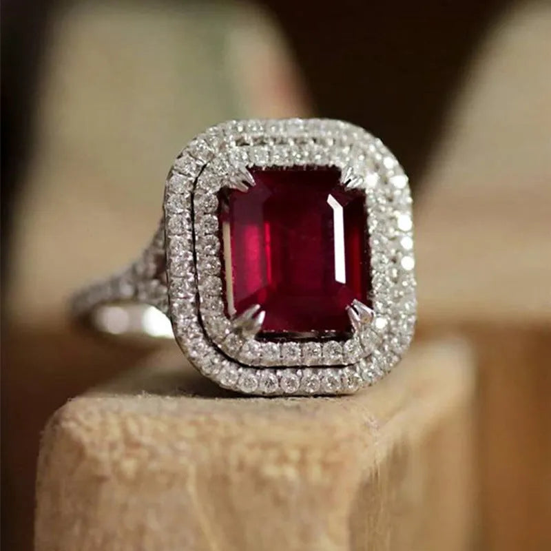 Red copper square geometric ring with rhinestone centrepiece for women, showing metallic construction