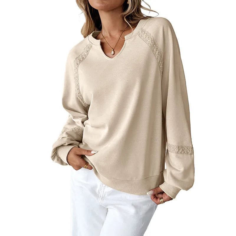 Women's loose fit sweater with half-open collar and lace stitching in solid colour