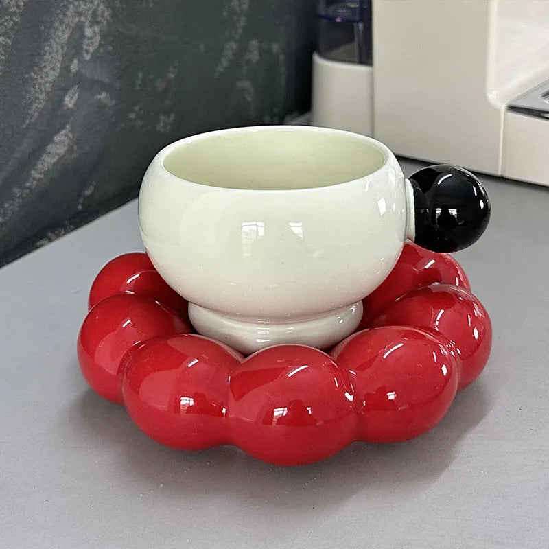 Nordic style ceramic coffee set with a 250ml cup and matching dish in a solid colour.