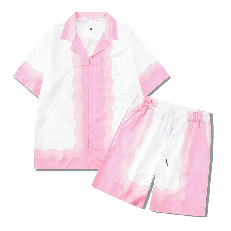 Men's and women's plaid print beach shirt and trouser casual outfit set on a hanger.