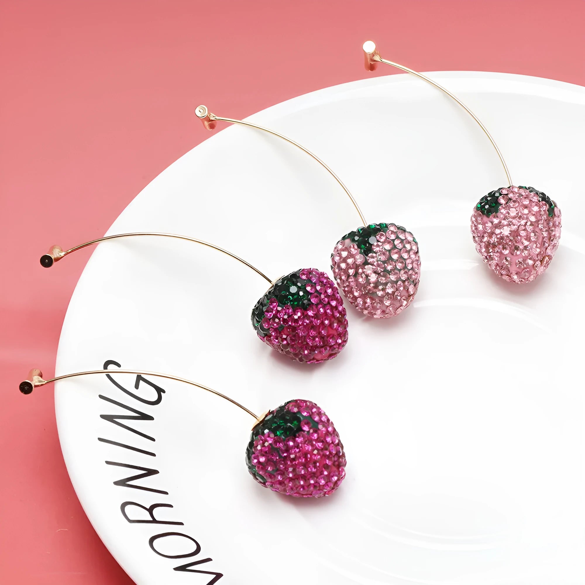 Geometric strawberry-shaped earrings with spot drill texture in red zinc alloy