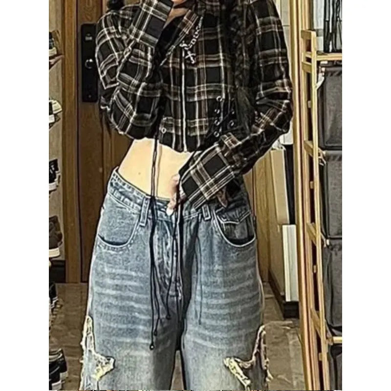 Blue high-waist straight-leg women's denim trousers on a hanger.