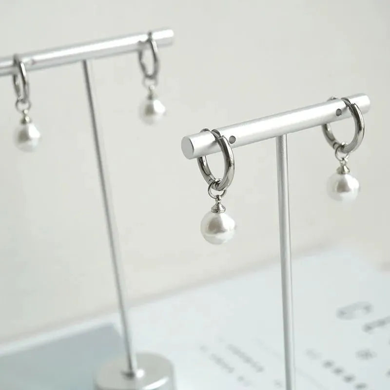 Women's geometric alloy pearl earrings with titanium steel posts in hip hop style