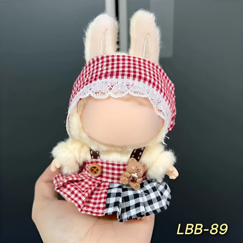 Plastic doll clothes costume for a 17cm vinyl action figure on a white background