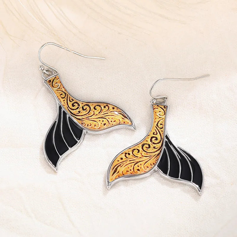 Women's retro fishtail earrings with whale motif in white gold colour finish