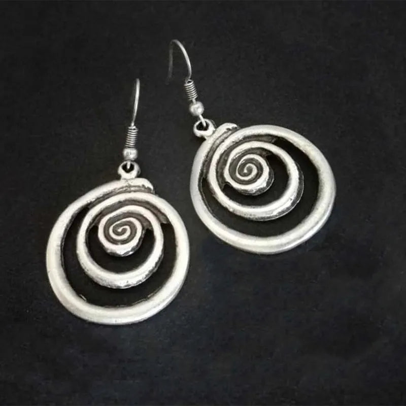 Retro geometric spiral earrings with distressed silver finish measuring 2.6 by 5 centimetres