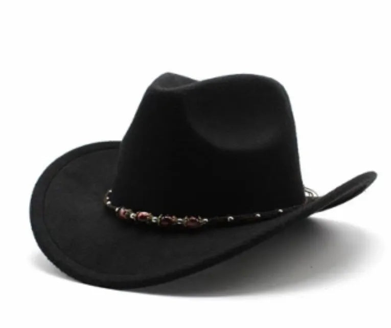 Brown leather velvet curved-edge western cowboy hat with a conical crown on a plain background.