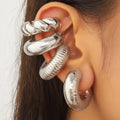Geometric non-pierced ear clips for women in gold and silver colours, set of four pieces