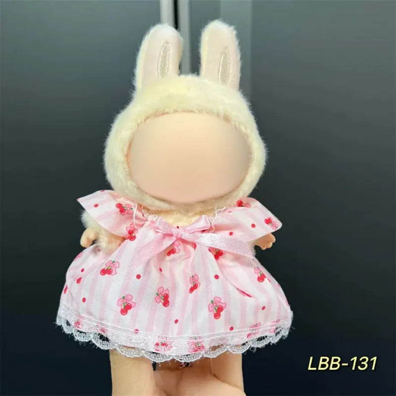 Plastic doll clothes costume for a 17cm vinyl action figure on a white background