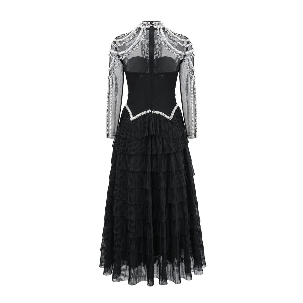 Women's black long sleeve dress with beaded decoration and mid waist design