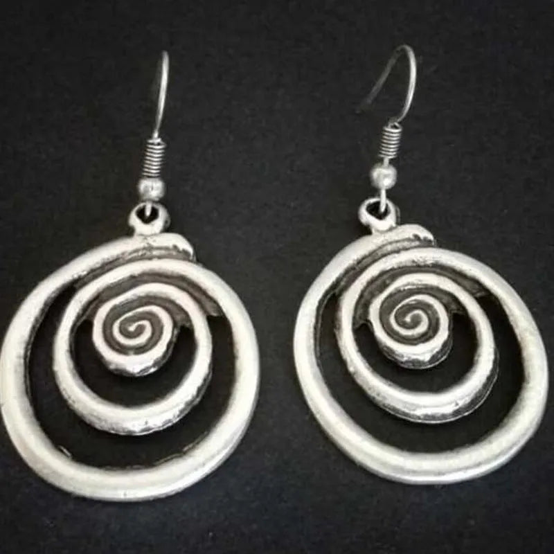 Retro geometric spiral earrings with distressed silver finish measuring 2.6 by 5 centimetres