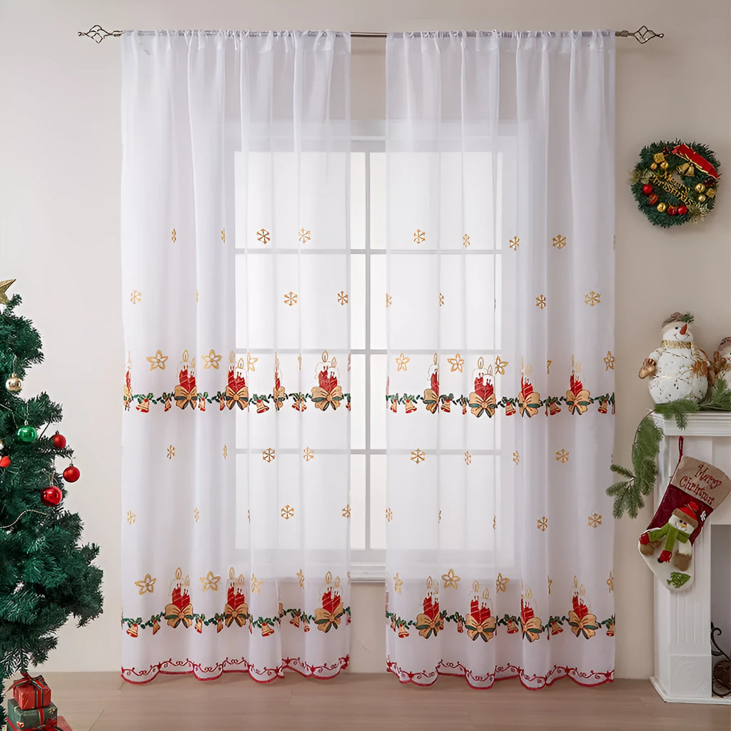 Pair of red and white Christmas curtains with embroidered snowflake design, showing light filtering through.