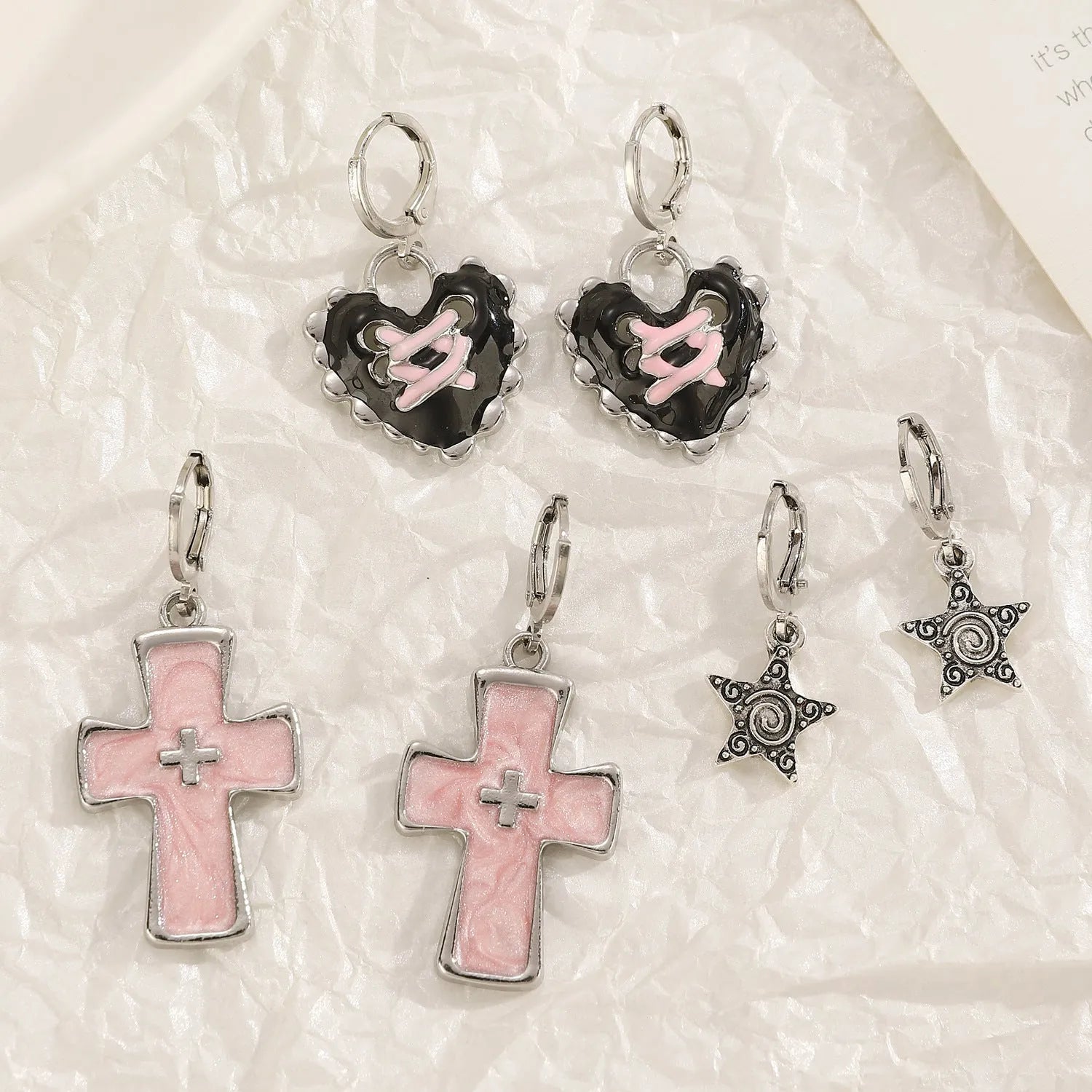 Women's cross crystal earrings in five colour variations with alloy construction and geometric design