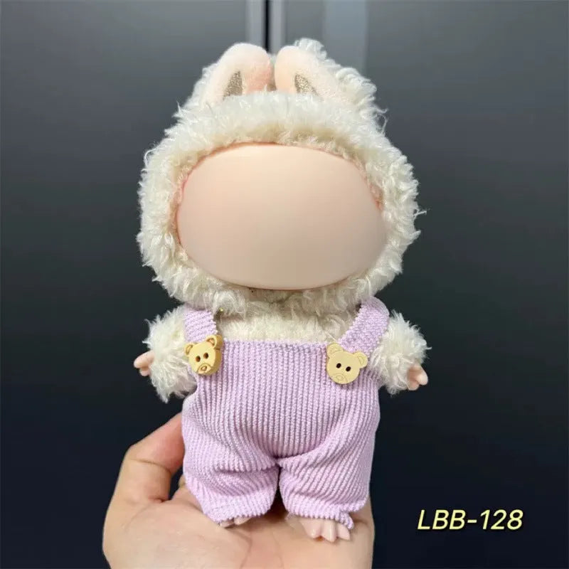 Plastic doll clothes costume for a 17cm vinyl action figure on a white background