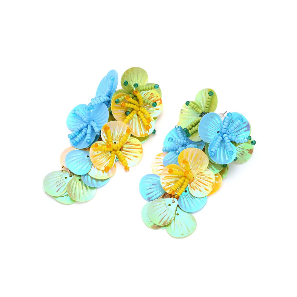 Handmade colourful string bead flower and leaf earrings in European and American exaggerated style.