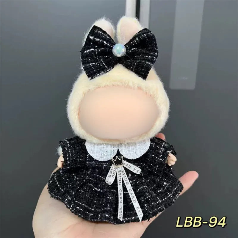 Plastic doll clothes costume for a 17cm vinyl action figure on a white background