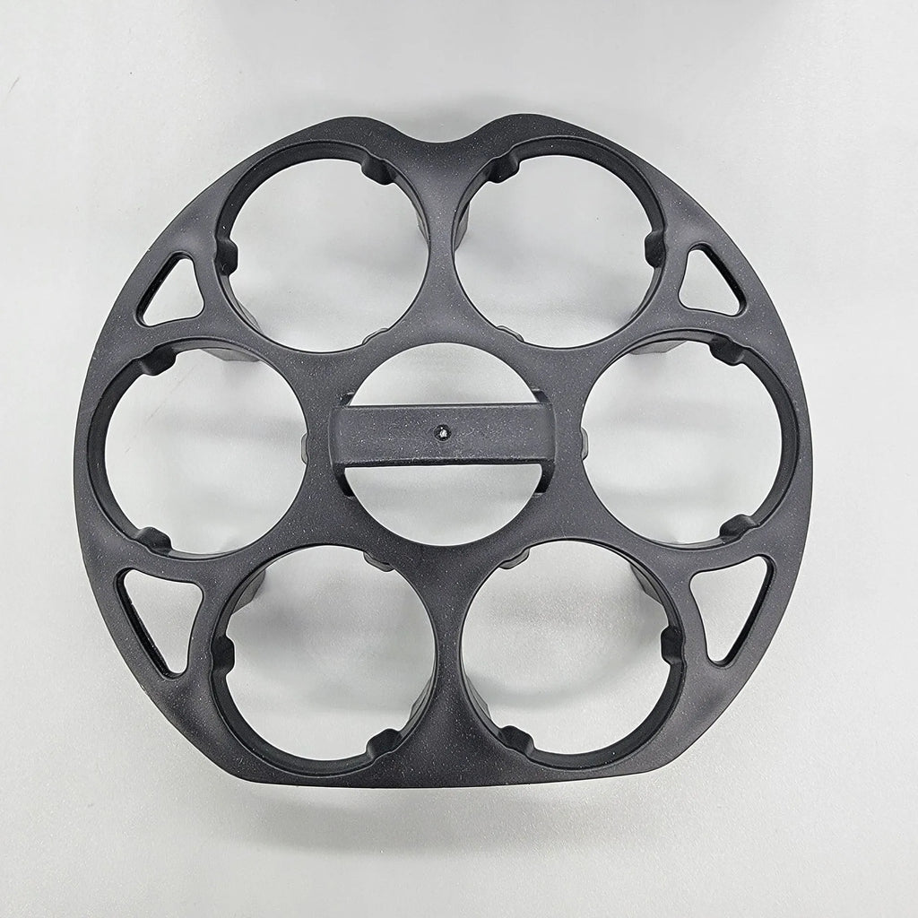 Black plastic egg holder with retainer design for kitchen storage, measuring 13.8cm by 12.6cm
