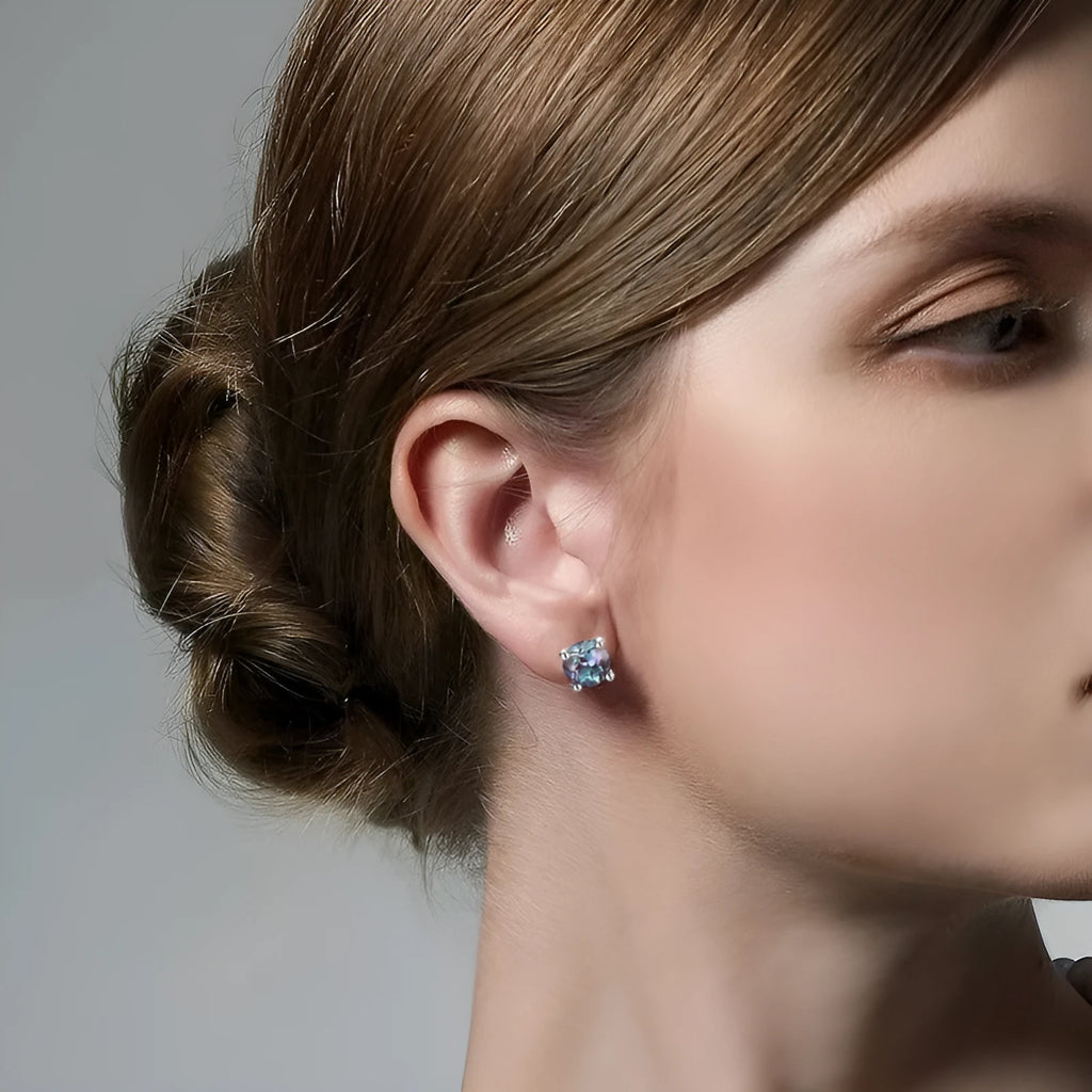 Silver ear studs with round cultivated Alexandrite stone in geometric setting