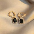 Geometric quadrilateral copper earrings with black zircon detailing in E2506 Black colour