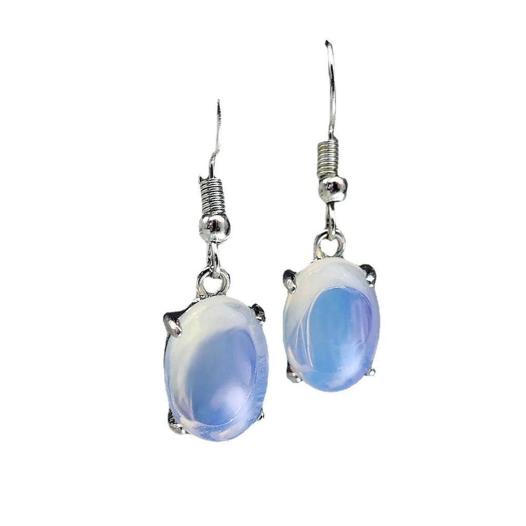 Moonlight white opal earrings with cross shaped drop design and retro moonstone appearance