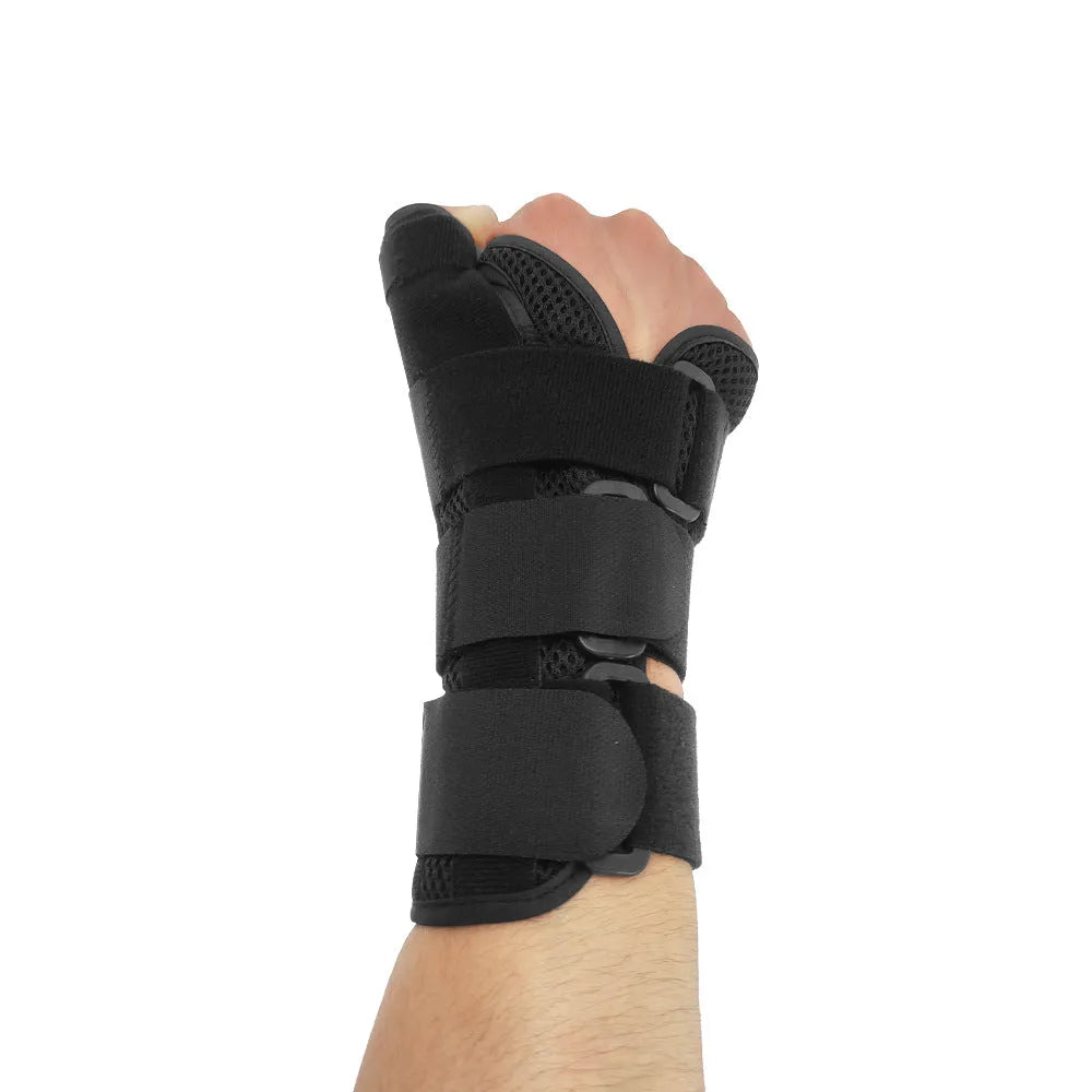 Black carbon fibre sports wrist guard with thumb strap and grey edging