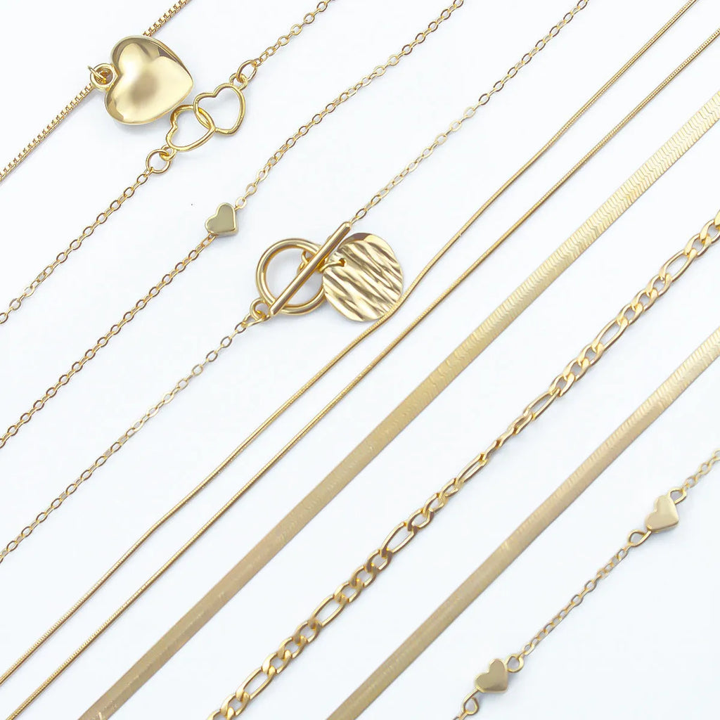 Women's gold electroplated 10-piece necklace set with snake bone chain and adjustable length