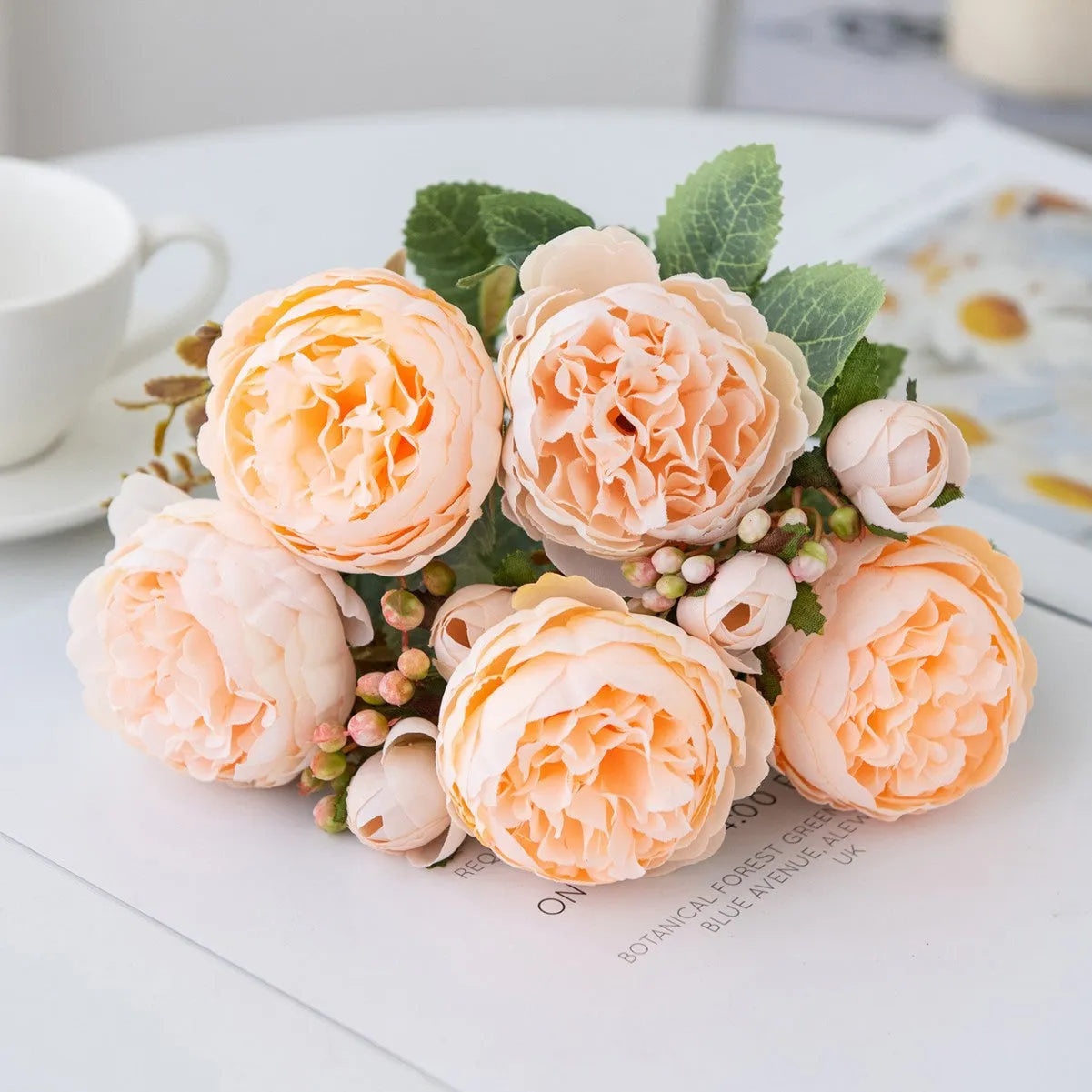 Artificial silk peony bouquet in champagne colour for home and wedding decoration.