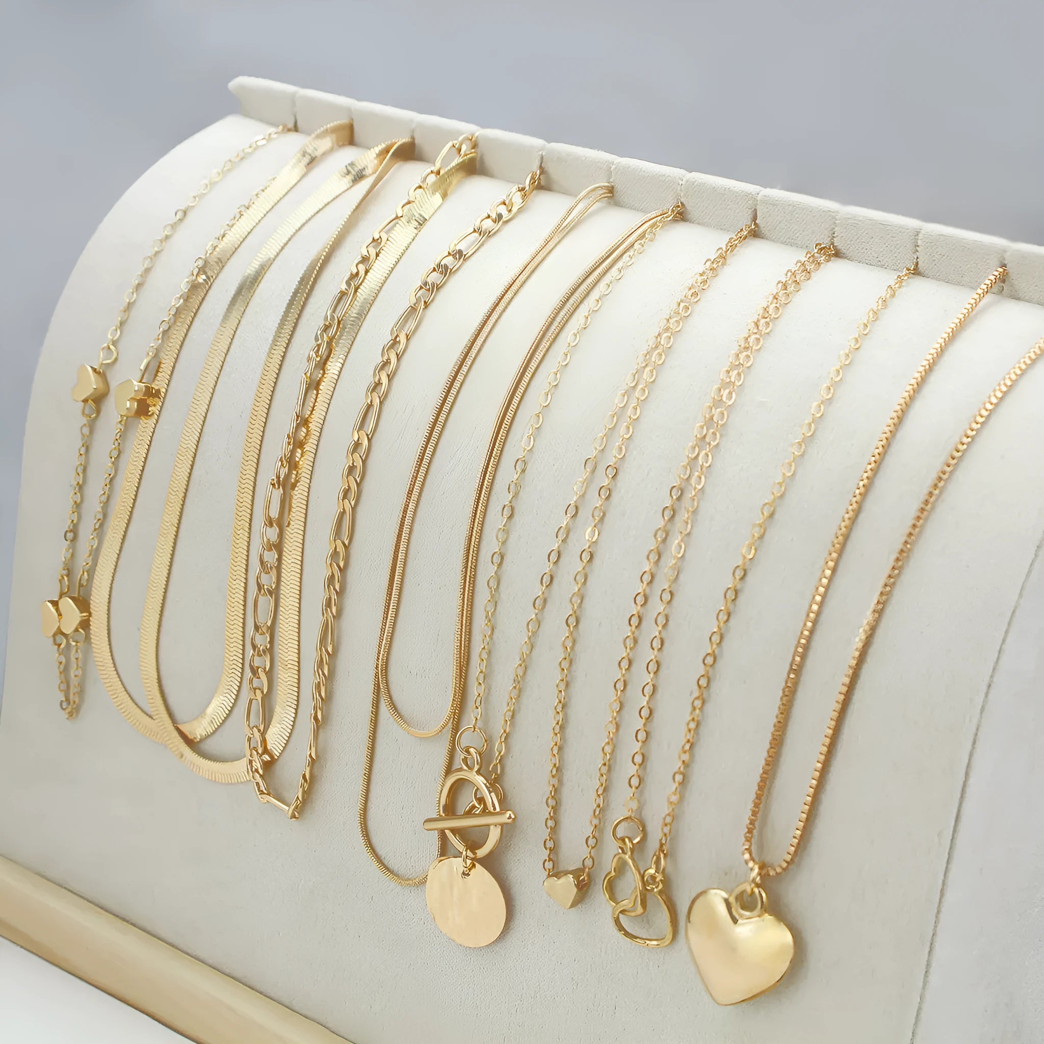 Women's gold electroplated 10-piece necklace set with snake bone chain and adjustable length