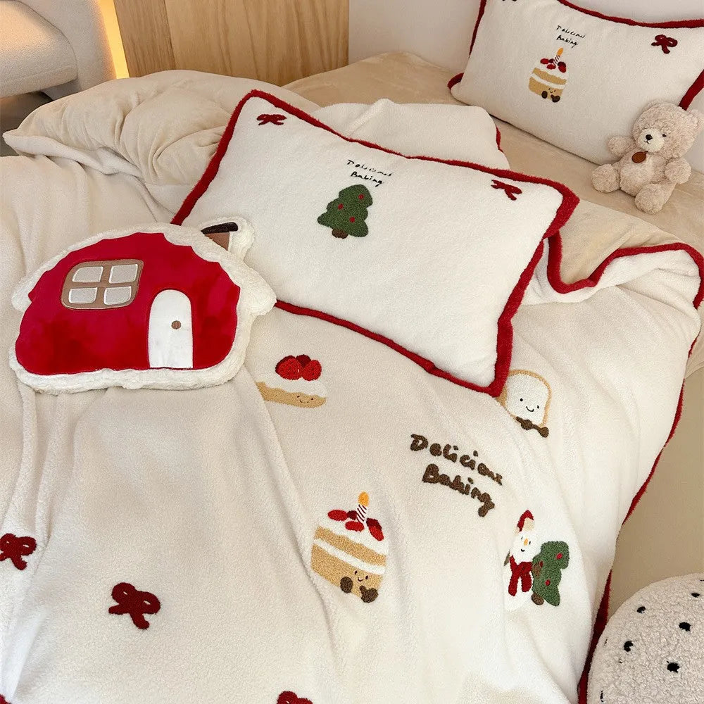 Winter Christmas cartoon pattern four-piece polyester bedding set showing heart design on duvet cover and pillowcases.