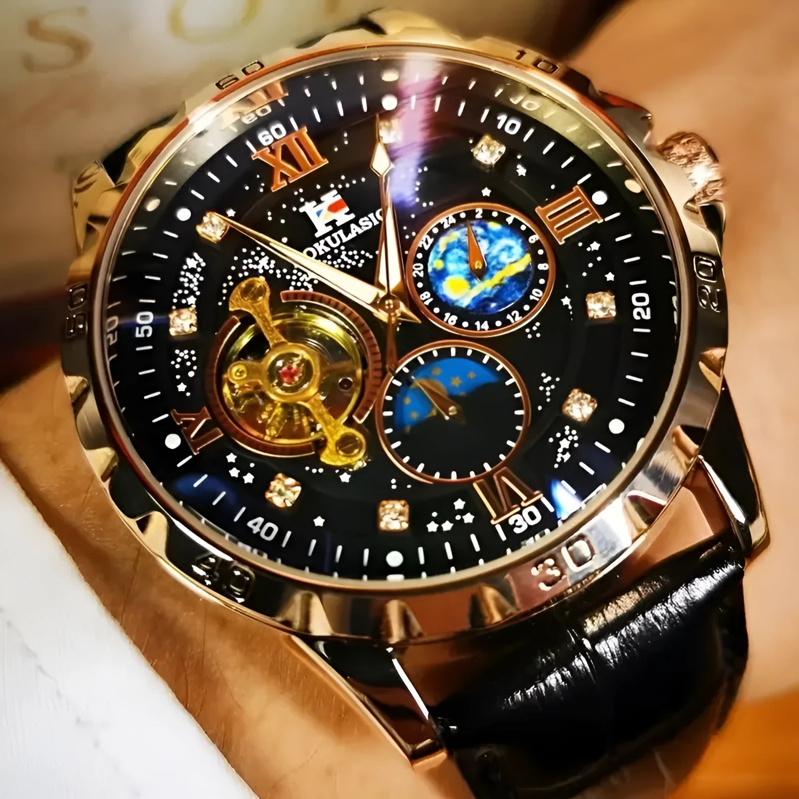 Black and rose gold automatic mechanical watch with hollow dial showing movement