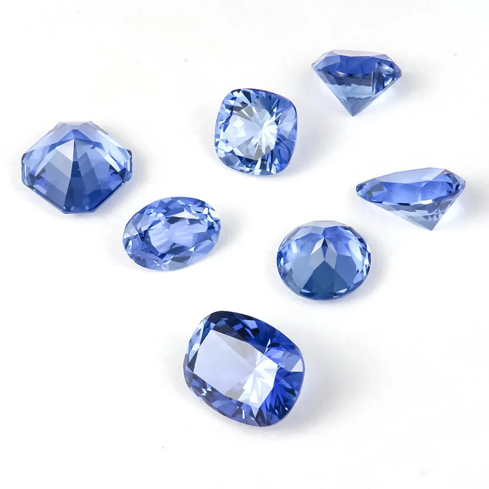 Royal blue love-shaped tiara cut gemstone for jewellery making on a white background.
