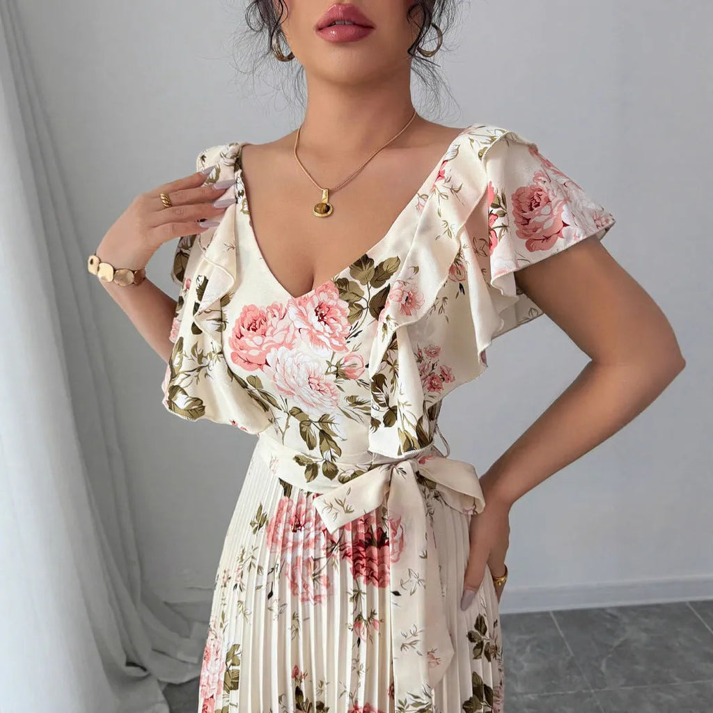 Apricot floral print v-neck dress with ruffled sleeves and oversized swing skirt