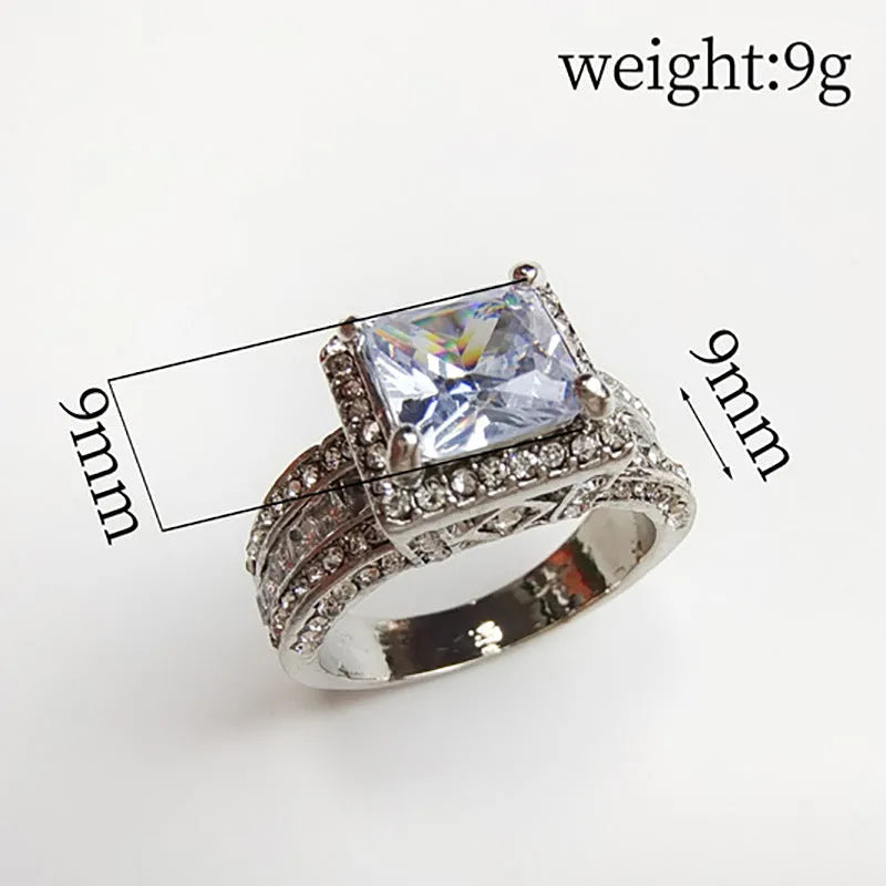 Geometric electroplated fashion ring in gold or white finish, women's sizes 5-13